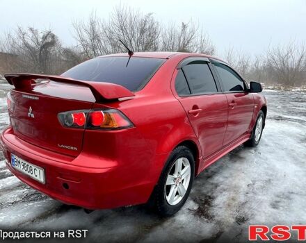 Червоний Міцубісі Lancer, об'ємом двигуна 2 л та пробігом 260 тис. км за 6400 $, фото 5 на Automoto.ua