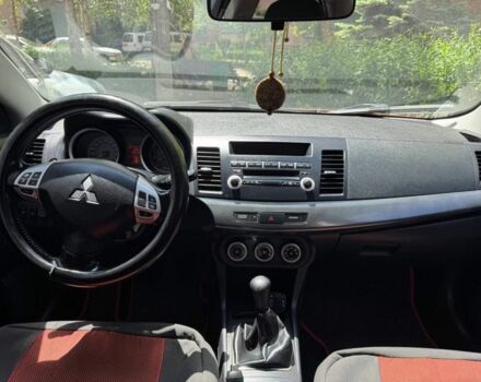 Червоний Міцубісі Lancer, об'ємом двигуна 2 л та пробігом 255 тис. км за 5200 $, фото 4 на Automoto.ua