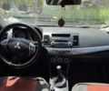 Червоний Міцубісі Lancer, об'ємом двигуна 2 л та пробігом 255 тис. км за 5200 $, фото 4 на Automoto.ua