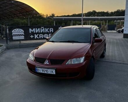 Червоний Міцубісі Lancer, об'ємом двигуна 1.6 л та пробігом 257 тис. км за 4600 $, фото 5 на Automoto.ua