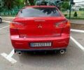 Червоний Міцубісі Lancer, об'ємом двигуна 2 л та пробігом 192 тис. км за 6000 $, фото 1 на Automoto.ua