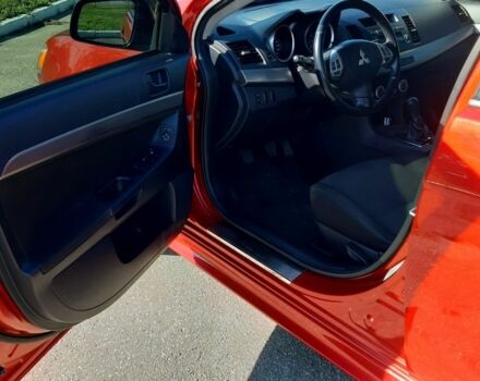 Красный Мицубиси Лансер, объемом двигателя 2 л и пробегом 110 тыс. км за 7500 $, фото 23 на Automoto.ua