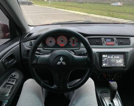 Червоний Міцубісі Lancer, об'ємом двигуна 1.6 л та пробігом 385 тис. км за 4500 $, фото 6 на Automoto.ua