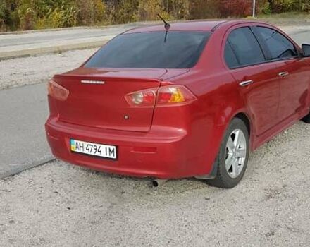 Червоний Міцубісі Lancer, об'ємом двигуна 2 л та пробігом 217 тис. км за 7100 $, фото 15 на Automoto.ua