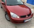 Червоний Міцубісі Lancer, об'ємом двигуна 1.6 л та пробігом 146 тис. км за 4500 $, фото 1 на Automoto.ua