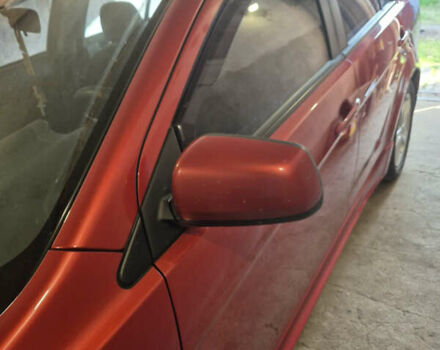 Красный Мицубиси Лансер, объемом двигателя 2 л и пробегом 65 тыс. км за 9300 $, фото 14 на Automoto.ua