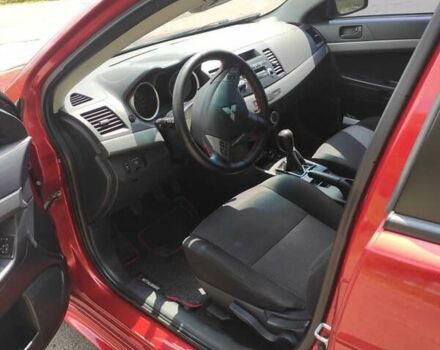 Червоний Міцубісі Lancer, об'ємом двигуна 2 л та пробігом 301 тис. км за 6200 $, фото 3 на Automoto.ua
