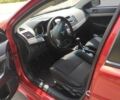 Червоний Міцубісі Lancer, об'ємом двигуна 2 л та пробігом 301 тис. км за 6200 $, фото 3 на Automoto.ua