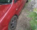 Червоний Міцубісі Lancer, об'ємом двигуна 1.6 л та пробігом 241 тис. км за 4000 $, фото 1 на Automoto.ua