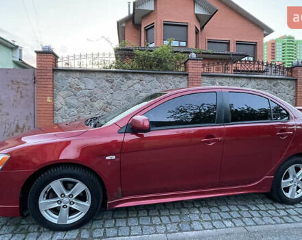 Міцубісі Lancer 2008 у Києві на Automoto.ua Червоний Міцубісі Lancer, об'ємом двигуна 2 л та пробігом 250 тис. км за 7000 $, фото 5 на Automoto.ua