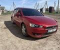 Червоний Міцубісі Lancer, об'ємом двигуна 2 л та пробігом 241 тис. км за 5500 $, фото 2 на Automoto.ua