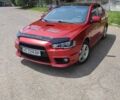 Червоний Міцубісі Lancer, об'ємом двигуна 2 л та пробігом 301 тис. км за 6200 $, фото 1 на Automoto.ua