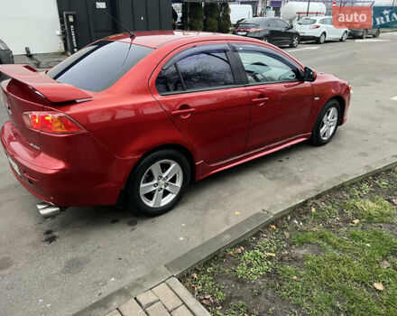 Красный Мицубиси Лансер, объемом двигателя 2 л и пробегом 330 тыс. км за 5250 $, фото 20 на Automoto.ua