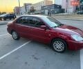 Красный Мицубиси Лансер, объемом двигателя 1.6 л и пробегом 220 тыс. км за 4500 $, фото 1 на Automoto.ua