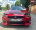 Красный Мицубиси Лансер, объемом двигателя 2 л и пробегом 262 тыс. км за 6200 $, фото 1 на Automoto.ua