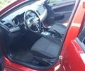 Червоний Міцубісі Lancer, об'ємом двигуна 2 л та пробігом 141 тис. км за 7600 $, фото 10 на Automoto.ua