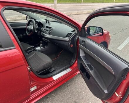 Красный Мицубиси Лансер, объемом двигателя 2 л и пробегом 366 тыс. км за 6500 $, фото 9 на Automoto.ua