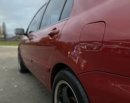 Червоний Міцубісі Lancer, об'ємом двигуна 1.6 л та пробігом 385 тис. км за 4500 $, фото 5 на Automoto.ua