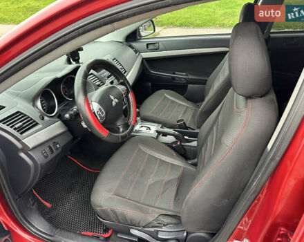 Червоний Міцубісі Lancer, об'ємом двигуна 2 л та пробігом 366 тис. км за 6500 $, фото 42 на Automoto.ua