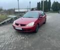 Красный Мицубиси Лансер, объемом двигателя 1.6 л и пробегом 265 тыс. км за 2956 $, фото 1 на Automoto.ua