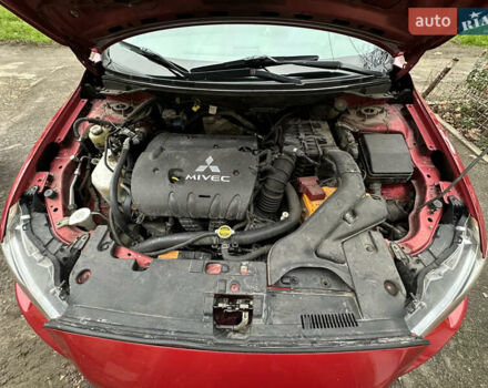 Червоний Міцубісі Lancer, об'ємом двигуна 2 л та пробігом 366 тис. км за 6500 $, фото 37 на Automoto.ua