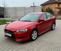 Червоний Міцубісі Lancer, об'ємом двигуна 2 л та пробігом 221 тис. км за 6100 $, фото 1 на Automoto.ua