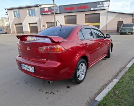 Червоний Міцубісі Lancer, об'ємом двигуна 2 л та пробігом 223 тис. км за 6950 $, фото 3 на Automoto.ua