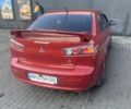 Червоний Міцубісі Lancer, об'ємом двигуна 2 л та пробігом 200 тис. км за 5350 $, фото 5 на Automoto.ua