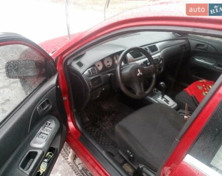 Червоний Міцубісі Lancer, об'ємом двигуна 1.6 л та пробігом 242 тис. км за 5100 $, фото 3 на Automoto.ua