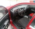 Червоний Міцубісі Lancer, об'ємом двигуна 1.6 л та пробігом 242 тис. км за 5100 $, фото 3 на Automoto.ua