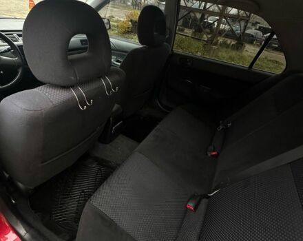 Червоний Міцубісі Lancer, об'ємом двигуна 1.6 л та пробігом 224 тис. км за 4300 $, фото 7 на Automoto.ua