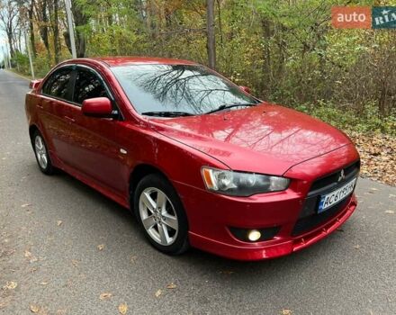 Красный Мицубиси Лансер, объемом двигателя 2 л и пробегом 197 тыс. км за 6500 $, фото 2 на Automoto.ua