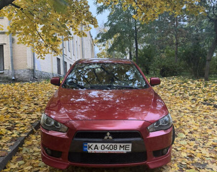 Червоний Міцубісі Lancer, об'ємом двигуна 2 л та пробігом 203 тис. км за 8000 $, фото 6 на Automoto.ua
