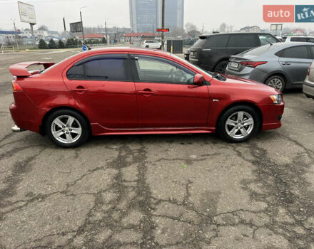 Красный Мицубиси Лансер, объемом двигателя 2 л и пробегом 330 тыс. км за 5250 $, фото 5 на Automoto.ua