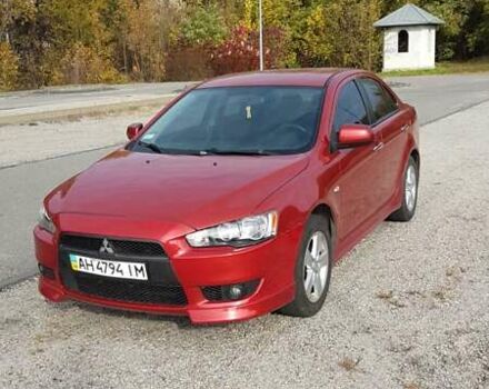 Червоний Міцубісі Lancer, об'ємом двигуна 2 л та пробігом 217 тис. км за 7100 $, фото 8 на Automoto.ua