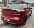Червоний Міцубісі Lancer, об'ємом двигуна 2 л та пробігом 209 тис. км за 6900 $, фото 6 на Automoto.ua