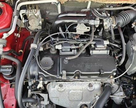 Червоний Міцубісі Lancer, об'ємом двигуна 1.6 л та пробігом 220 тис. км за 5800 $, фото 17 на Automoto.ua