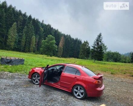 Червоний Міцубісі Lancer, об'ємом двигуна 2 л та пробігом 140 тис. км за 8500 $, фото 1 на Automoto.ua