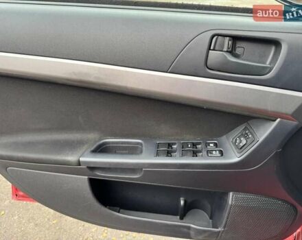 Червоний Міцубісі Lancer, об'ємом двигуна 1.5 л та пробігом 190 тис. км за 6700 $, фото 11 на Automoto.ua