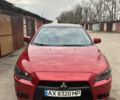 Червоний Міцубісі Lancer, об'ємом двигуна 2 л та пробігом 209 тис. км за 6900 $, фото 7 на Automoto.ua