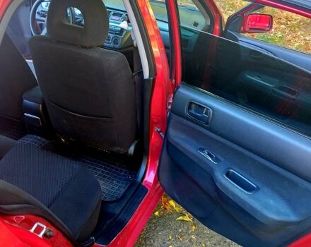 Красный Мицубиси Лансер, объемом двигателя 1.6 л и пробегом 144 тыс. км за 6000 $, фото 5 на Automoto.ua