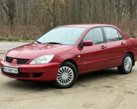 Червоний Міцубісі Lancer, об'ємом двигуна 1.6 л та пробігом 220 тис. км за 4600 $, фото 1 на Automoto.ua