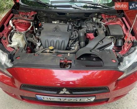 Красный Мицубиси Лансер, объемом двигателя 1.5 л и пробегом 124 тыс. км за 7100 $, фото 1 на Automoto.ua