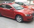 Червоний Міцубісі Lancer, об'ємом двигуна 2 л та пробігом 141 тис. км за 7600 $, фото 16 на Automoto.ua