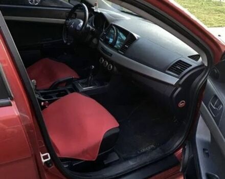 Червоний Міцубісі Lancer, об'ємом двигуна 2 л та пробігом 300 тис. км за 3700 $, фото 7 на Automoto.ua