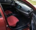 Червоний Міцубісі Lancer, об'ємом двигуна 2 л та пробігом 300 тис. км за 3700 $, фото 7 на Automoto.ua