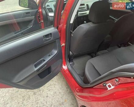 Красный Мицубиси Лансер, объемом двигателя 1.5 л и пробегом 124 тыс. км за 7100 $, фото 4 на Automoto.ua