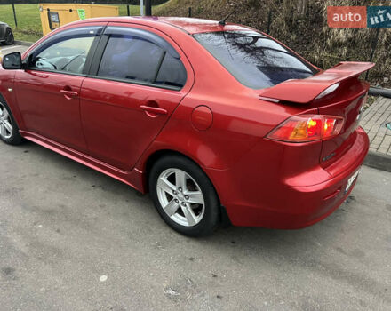 Красный Мицубиси Лансер, объемом двигателя 2 л и пробегом 330 тыс. км за 5250 $, фото 22 на Automoto.ua