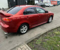 Красный Мицубиси Лансер, объемом двигателя 2 л и пробегом 330 тыс. км за 5250 $, фото 26 на Automoto.ua