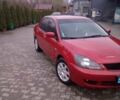 Червоний Міцубісі Lancer, об'ємом двигуна 1.6 л та пробігом 191 тис. км за 4900 $, фото 1 на Automoto.ua